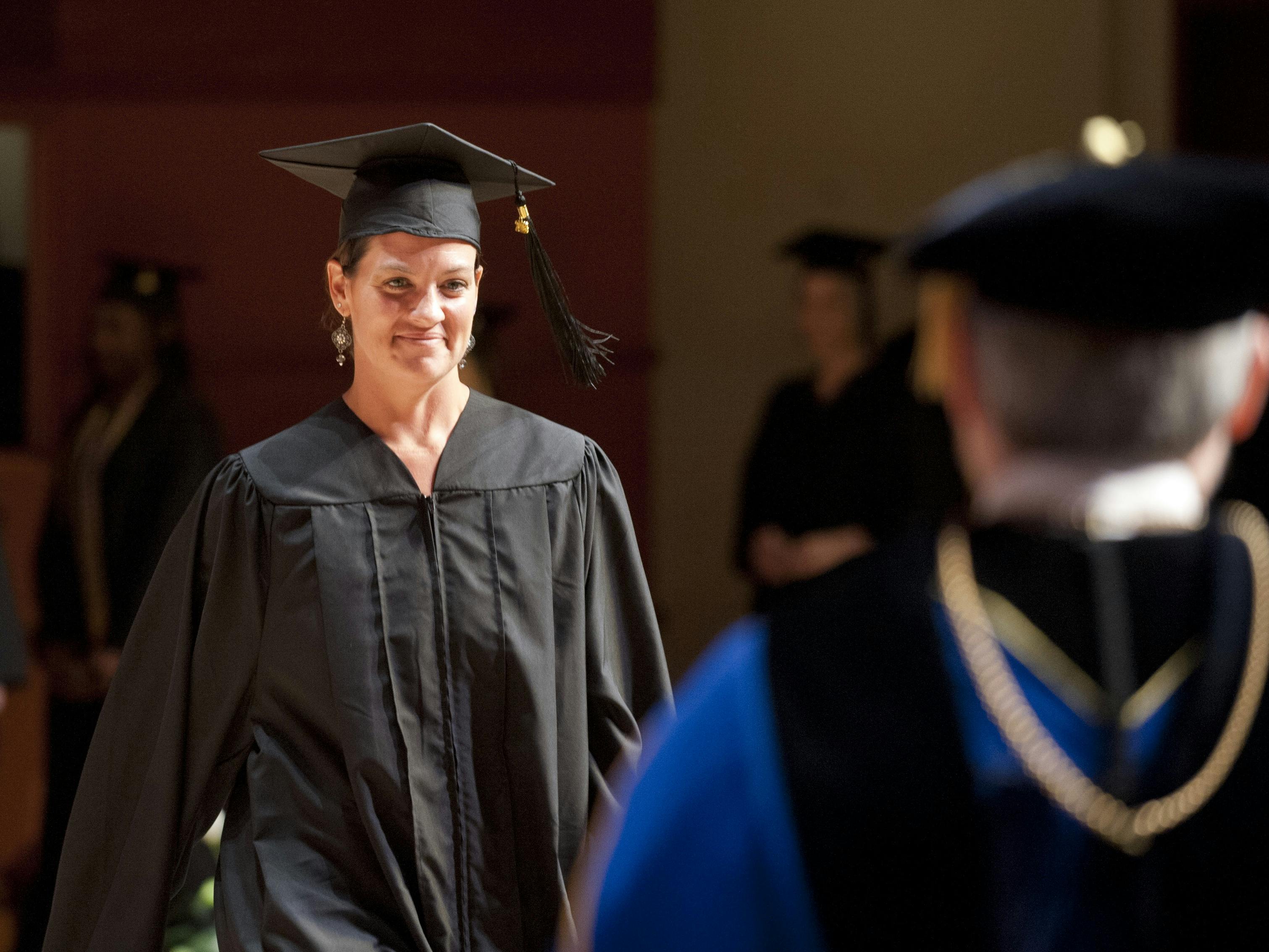 Adult undergrad student graduating