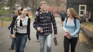 Students walk on a path at Bethel University.