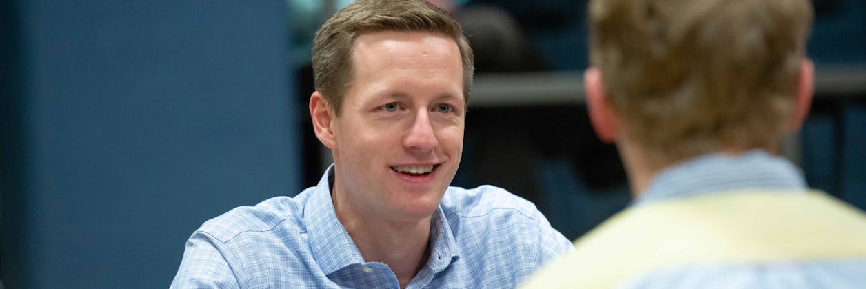 Two people in conversation