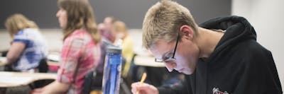 BUILD students learn in class
