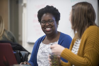 Student smiling in class