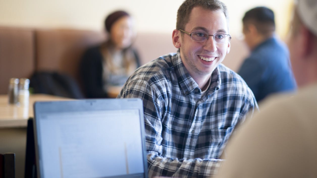 Students are chatting. 