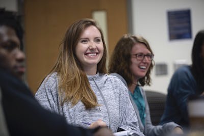 girl smiling in classroom 