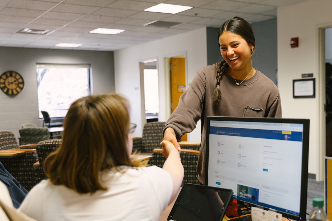 Student meeting a career specialist.