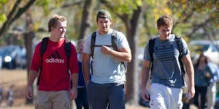 Students walking together across campus