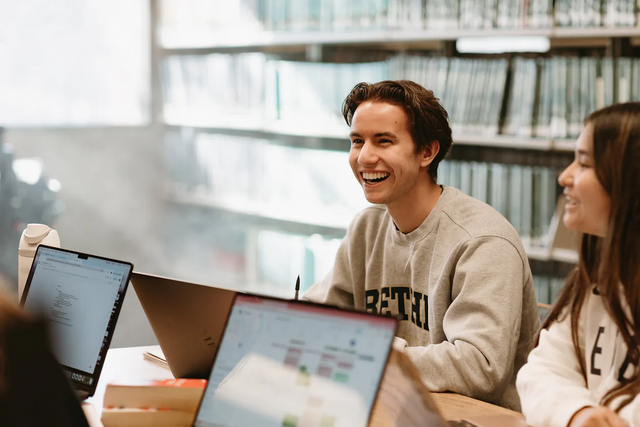 Student in Bethel sweatshirt smiling