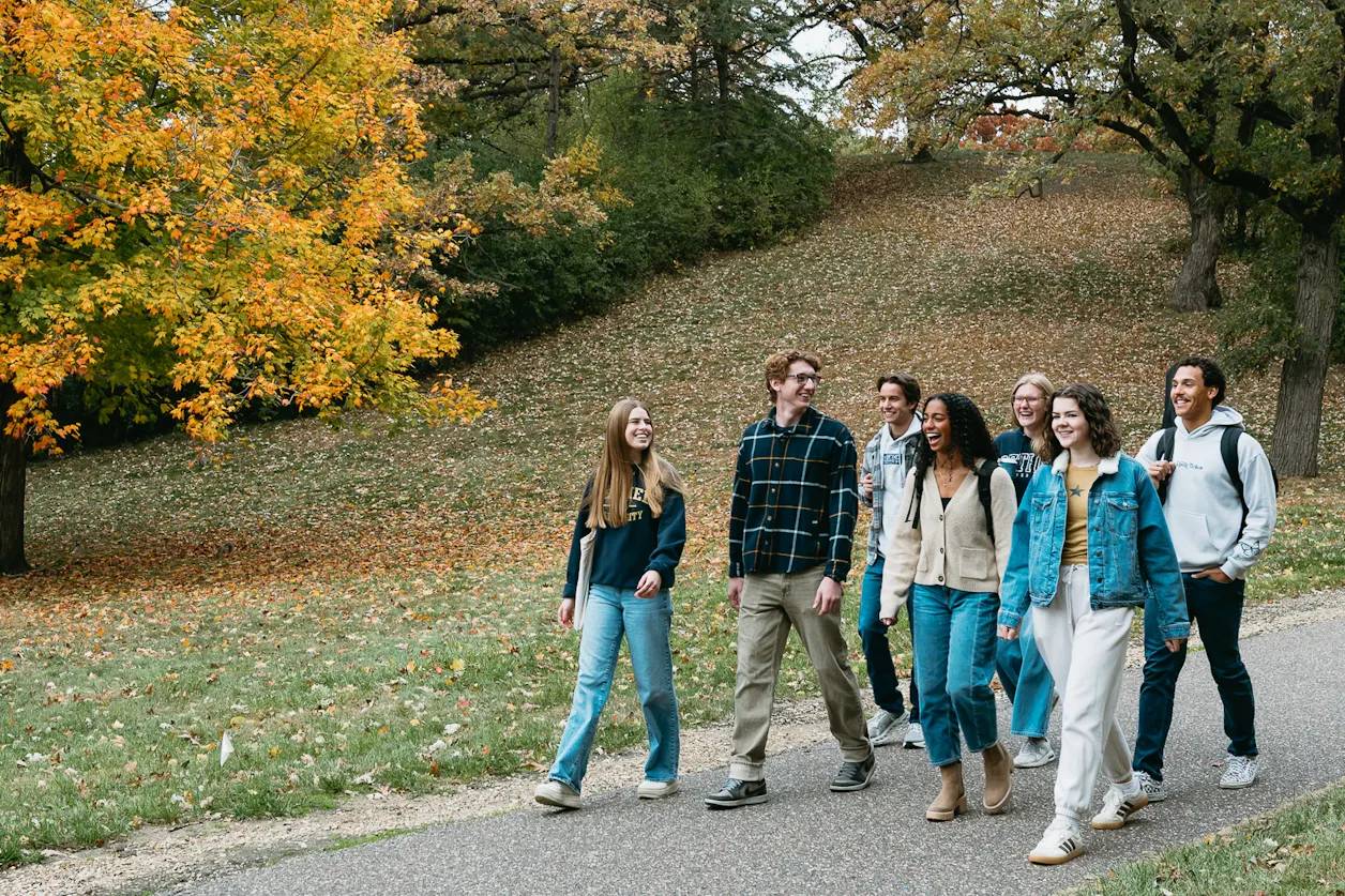 Students walking through fall campus