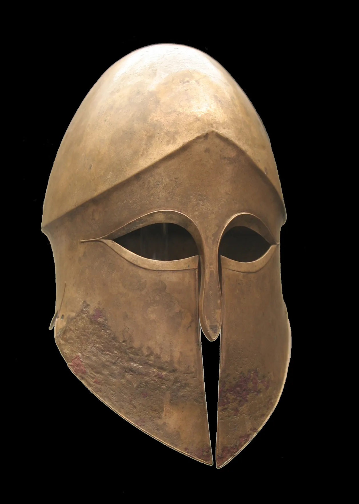 A bronze colored Corinthian helmet mask with almond shaped eye openings, and thin triangular opening over the mouth.