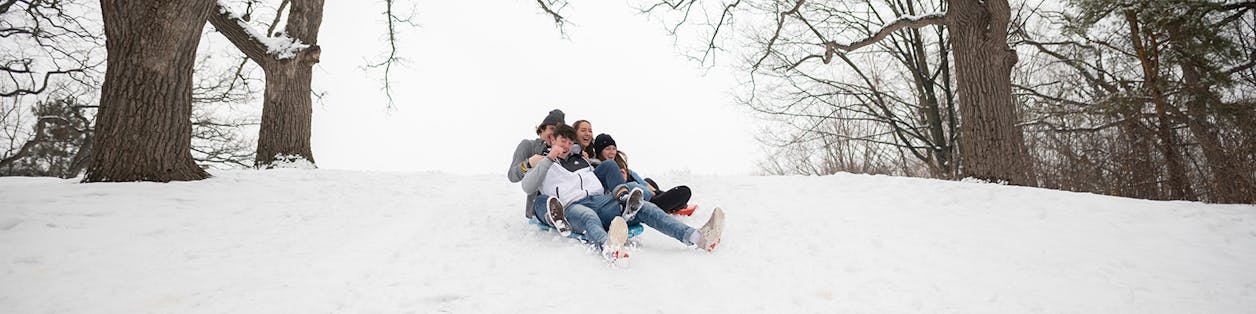 Bethel University students sled down Sem Hill 