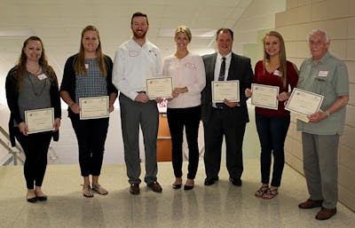 Twin Cities Outreach Team Accepts EXCEL Award for Adaptive Swimming Instruction