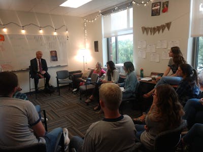 New York Times columnist David Brooks speaks with Bethel journalism students.