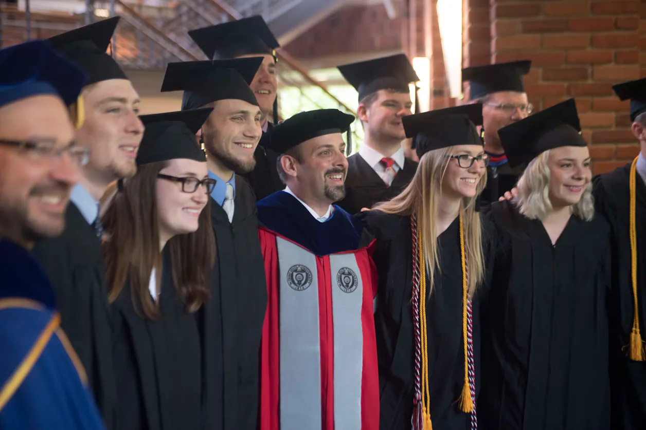 Professor of Political Science Christopher Moore (center) was one of six Bethel faculty members across all four schools to be recognized for their excellence in teaching, scholarship, and service.