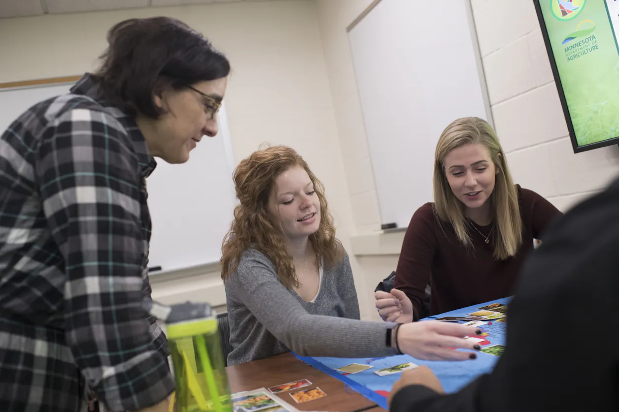 Education students work together in a classroom