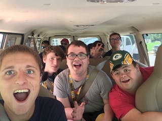 Brady Tongen '20 is a mentor in Bethel's BUILD program. Here he's shown with students in the program, on a field trip. 
