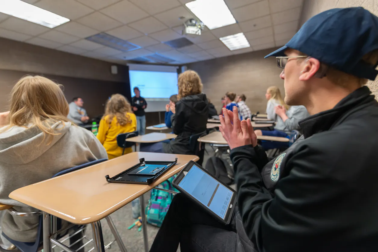 Students use iPads to present in class