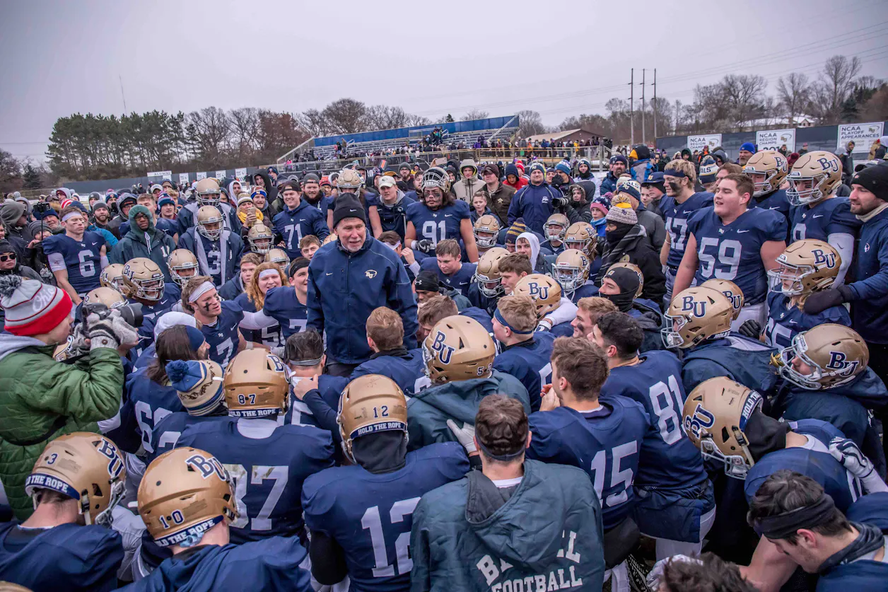 Bethel Football Head Coach Steve Johnson talks to Bethel football players after a game this fall. (Photo credit: Carl Schmuland)