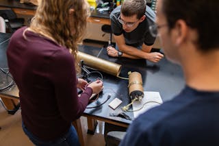 Rocket Club members assemble components in Bethel's Electrical Engineering Lab