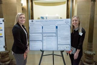 Psychology majors Sydnie Sybrant ’20 and Meg Thorison ’19 presented their research on “Adopted Mother’s Religious Meaning Regarding Adoption.” 