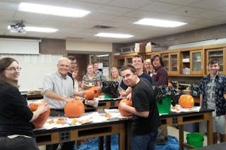 Bethel’s Society of Physics Students (SPS) chapter at a pumpkin carving Halloween party. (Photo Credit: Provided by Aaron Coe and Alyssa Hamre)