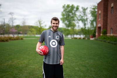 Tyler Sarff BUILD'19 outside Benson Great Hall at Bethel University