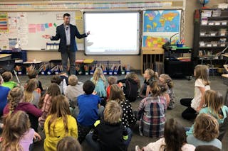 Associate Professor of Chemistry Brandon Winters shares with Foley Elementary third-graders about his Interim trip to Ecuador and the Galápagos Islands. 