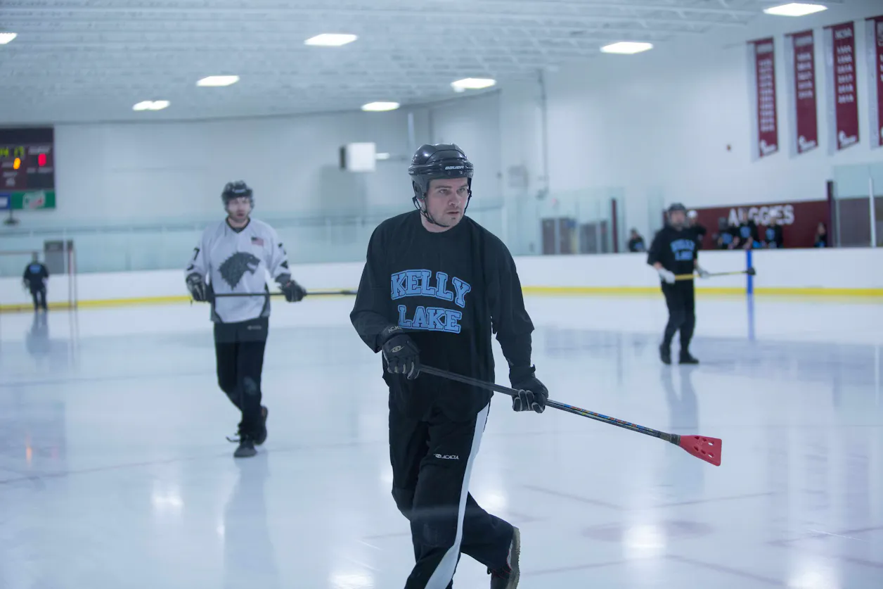 Broten playing broomball