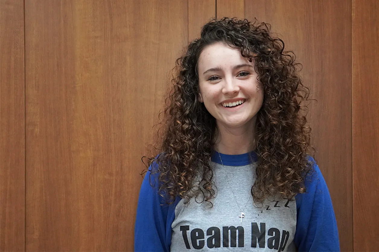 Student Employee of the Year award winner, Elizabeth McClure, wearing her Dining Center team shirt during finals week.