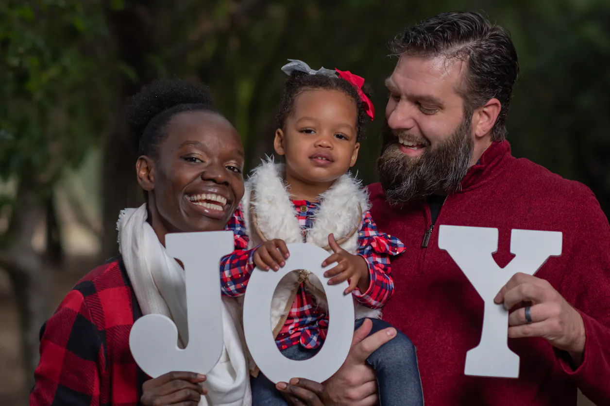 Momanyi-Hiltsley with her daughter, Jaydah Rae, and husband, Bart. 