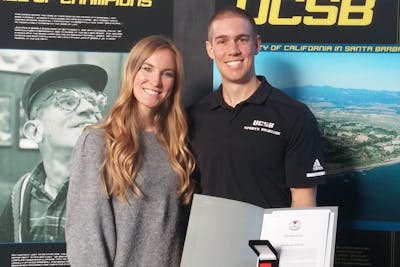 Smidt and his wife, Chelsea, stand for a photo after Smidt is presented the American Red Cross' Certificate of Merit.