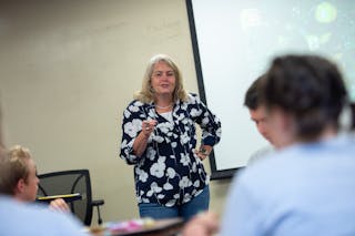 Professor Peggy Kendall teaches high school students that attended Living the Questions in 2019.