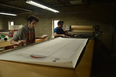 Production of masks at a local athletic wear company