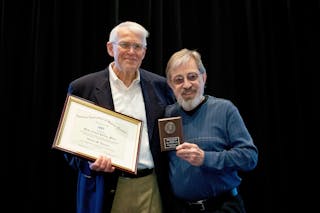 Peterson is presented the Melba Newell Phillips Medal by fellow former AAPT President Gordon Ramsey at the Orlando Winter Meeting.