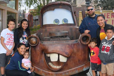 Sarah Sanchez '17 and some of her siblings, nieces, and nephews when they visited Disneyland in 2019.