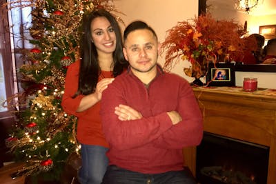 Jesus Estrada, CAPS’20, and his wife. 