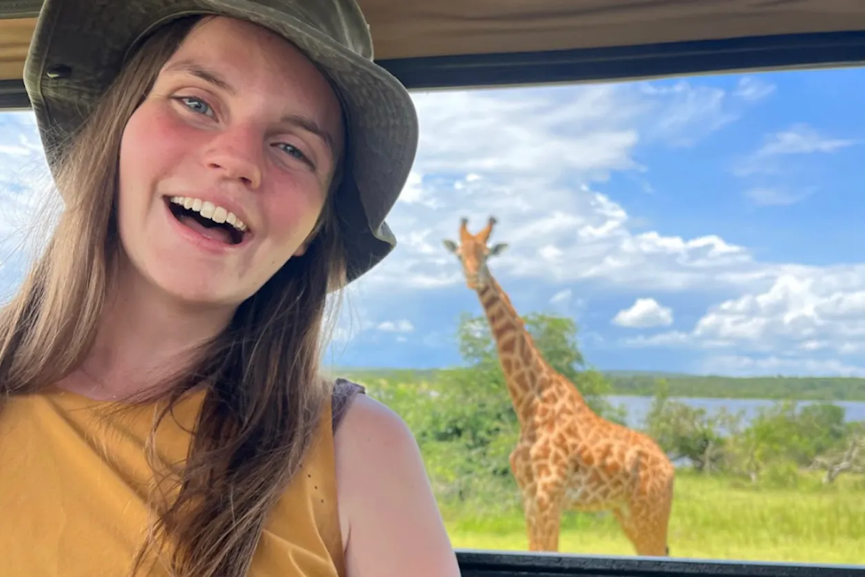 Alise Ostercamp with a giraffe