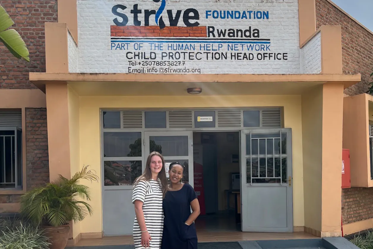 Alise Ostercamp outside the Strive Foundation Rwanda office.
