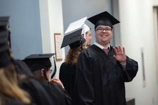 Student in BUILD program graduating