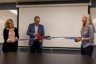 Pictured here at the ribbon-cutting ceremony are Angela Sabates, chair of the psychology department; President Ross Allen; and Amy Dykstra, chair of the biological sciences department. 