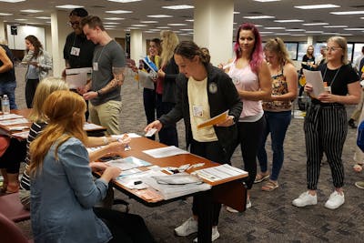 Bethel University students participating in the poverty simulation