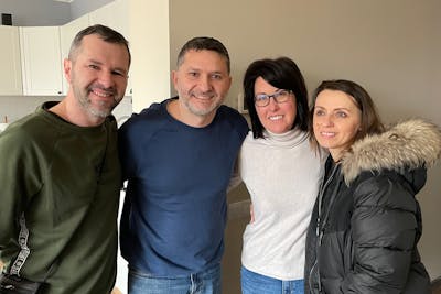 Petry and Kyle Groza with Ukrainian refugees