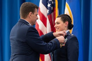 Maj. Lunning receiving the Distinguished Flying Award on Jan 7.