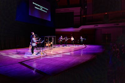 A United Worship Ministries team leads Vespers in Benson Great Hall. 