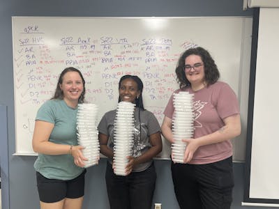 Professor of Biological Sciences Melissa Cordes, C. Wheldon Jones Scholar Misgana Mamo ’24 and Edgren Scholar Emily Schmidt ’24 kicking off their research project in summer 2023 