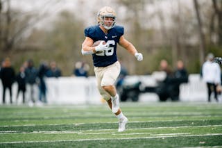 Ellingson runs the ball at Royal Stadium