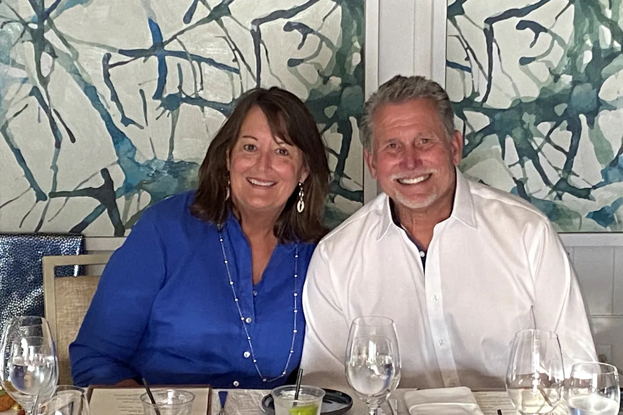 Retired Head Football Coach Steve Johnson ’79 and his wife, Susan