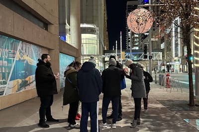 Bethel students and ICCM volunteers pray over people on Nicollet Avenue in downtown Minneapolis.