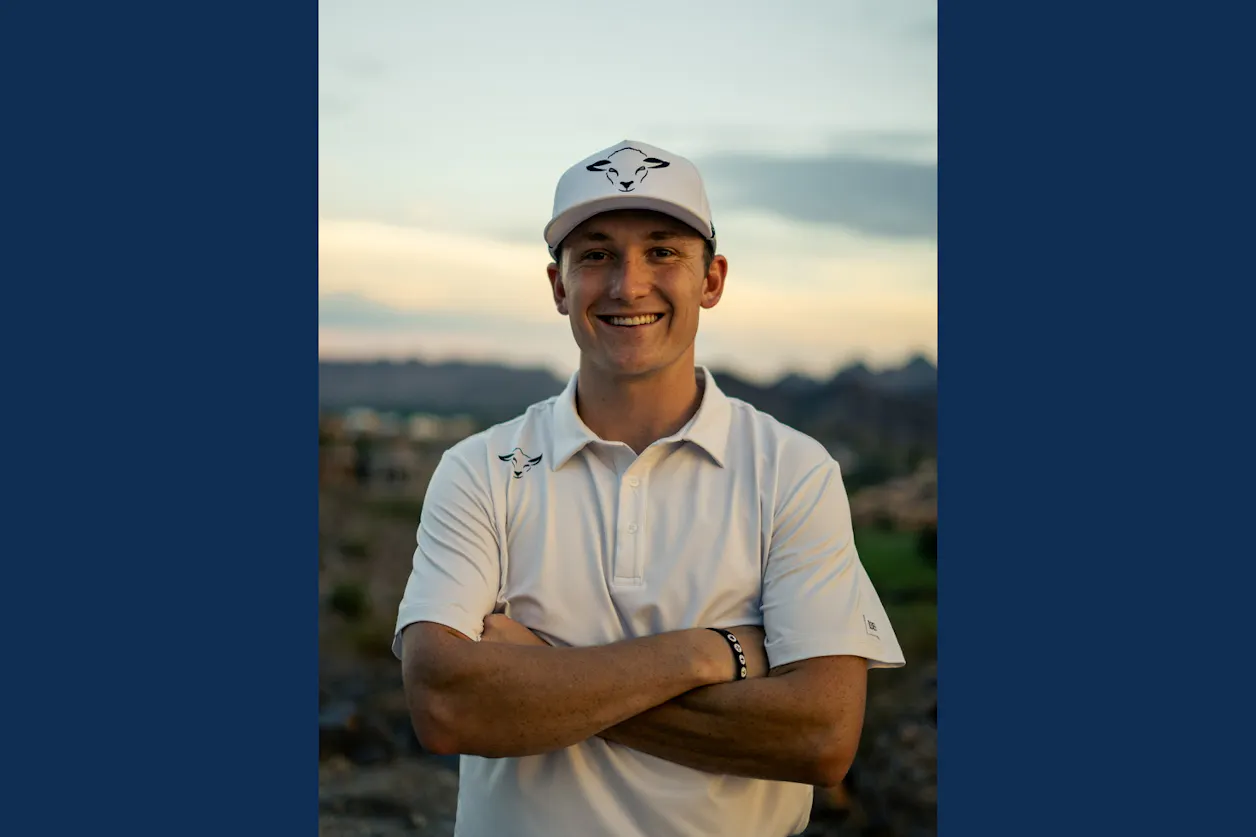 Adam Bricker, pictured in golf clothing that features a sheep. 