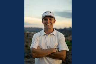 Adam Bricker, pictured in golf clothing that features a sheep. 