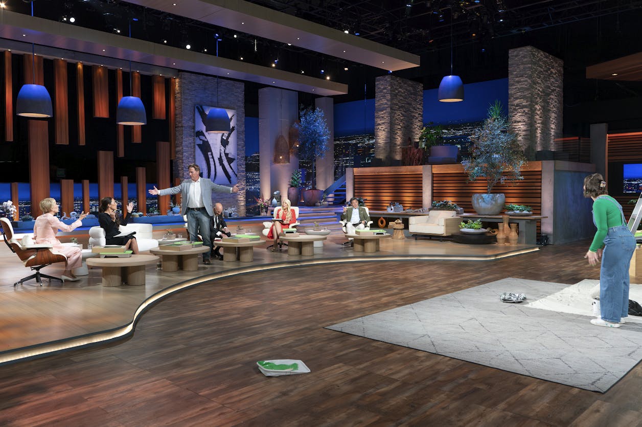 Wide angle shot of Billie on the set of Shark Tank