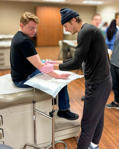 PA students practice drawing blood